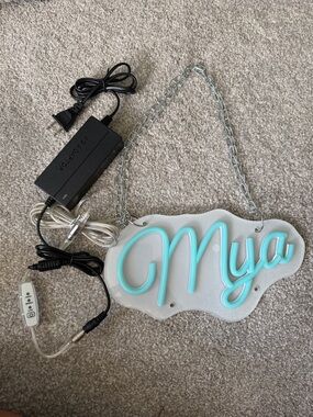 Custom 'Mya' Aqua Script Neon Name Sign